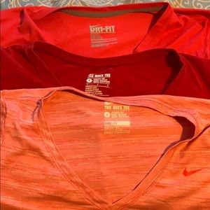 Nike tops all size Large, shades of red
